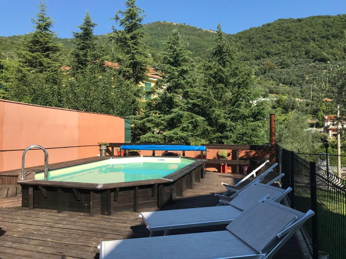Casa Ginni con Piscina e giardino Caravonica Esterno foto