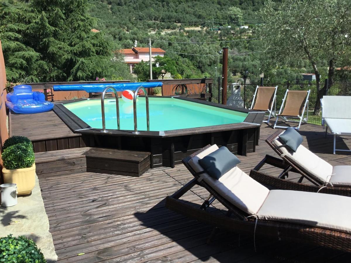 Casa Ginni con Piscina e giardino Caravonica Esterno foto