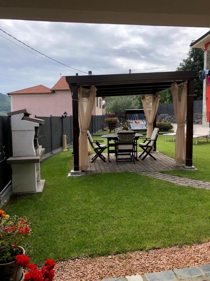 Casa Ginni con Piscina e giardino Caravonica Esterno foto