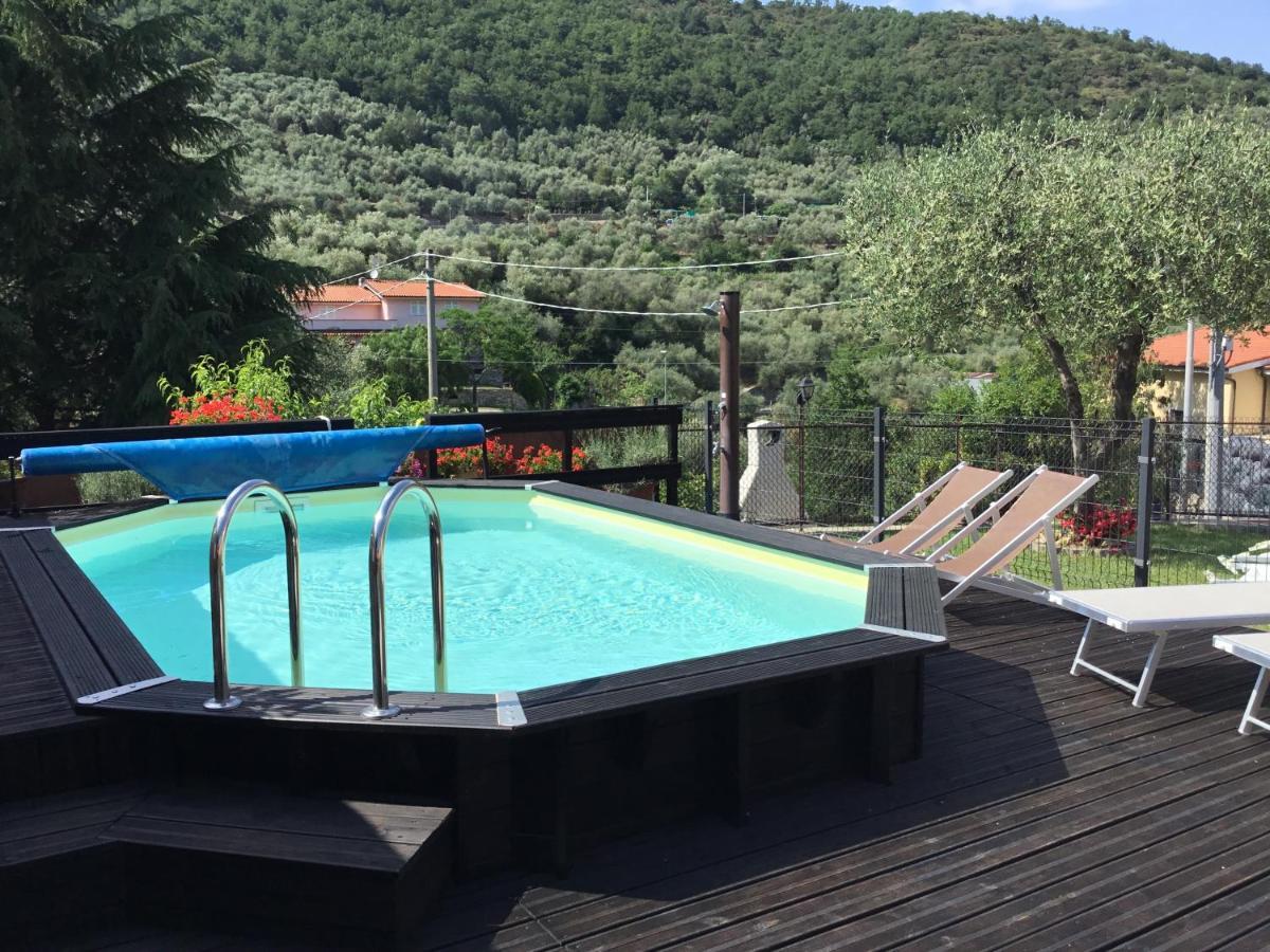 Casa Ginni con Piscina e giardino Caravonica Esterno foto